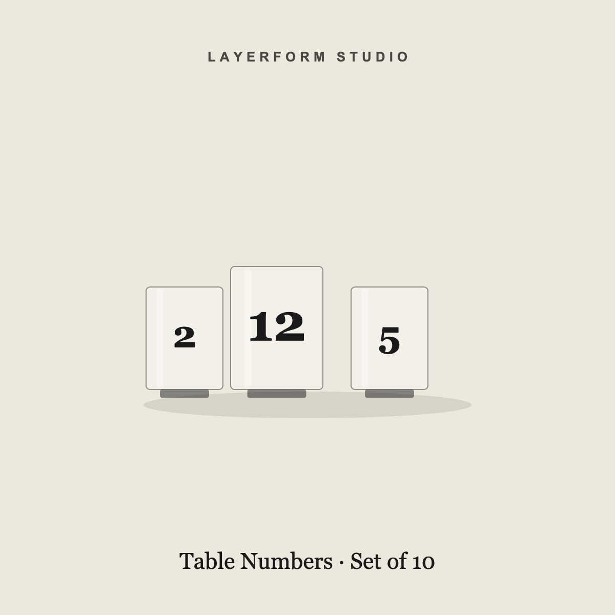 Set of acrylic and wood table numbers by LayerForm Studio