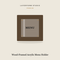 Walnut wood-framed acrylic menu holder by LayerForm Studio
